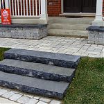 Black flagstone steps and wall caps