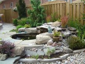 National Landscape, interlocking stone, flagstone, wood structures, and landscaping. Serving the Greater Toronto Area (GTA) for over 20 years including Acton, Bolton, Brampton, Bramalea, Burlington, Etobicoke, Georgetown, Guelph, Halton Hills, Milton, Mississauga, Nobleton, Oakville, Orangeville, Rockwood, and more. Ontario, Canada. - Backyards